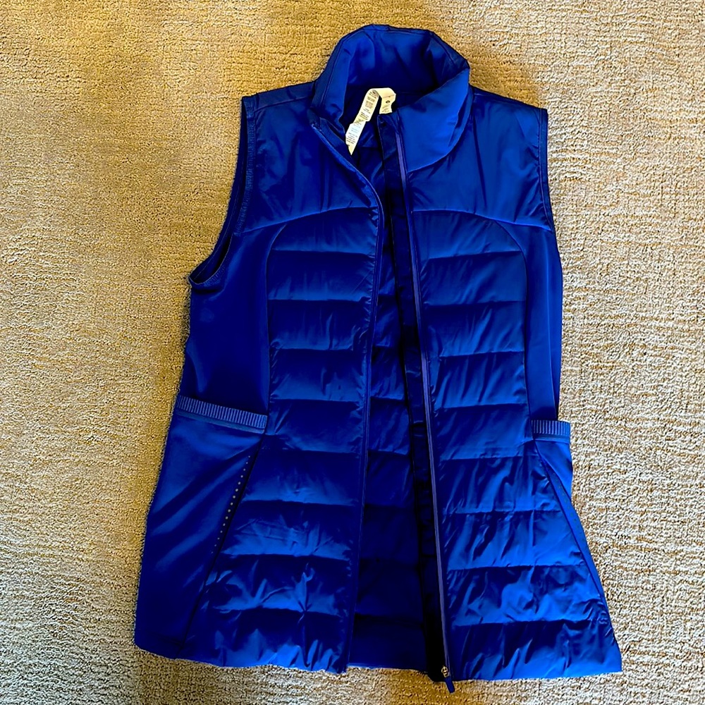 Never worn Lululemon down for it all vest. Royal blue color, side pockets